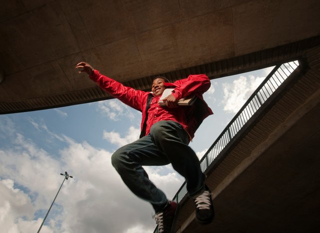 man jumping in urban setting