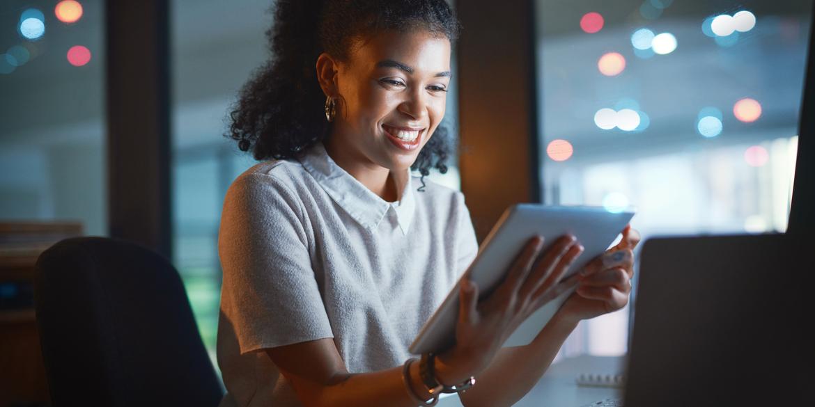 Woman holding mobile device.