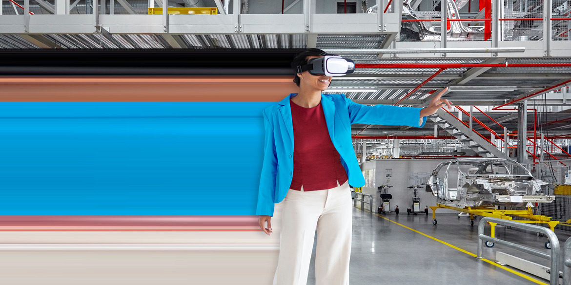 Woman in factory using virtual reality.