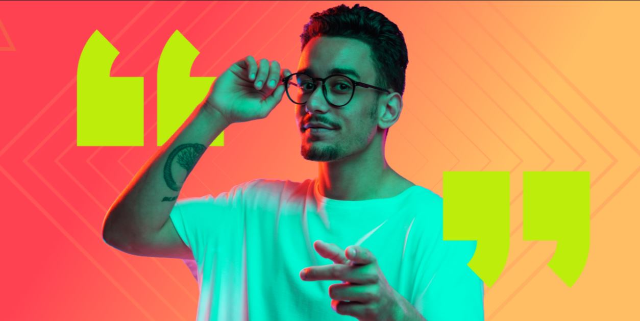 Man with glasses holding edge of glasses with one hand - colourful background with quotation marks.