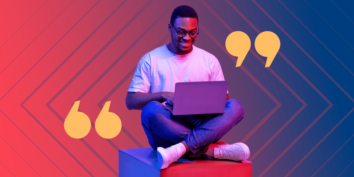 Man sitting with legs crossed and laptop on his lap.