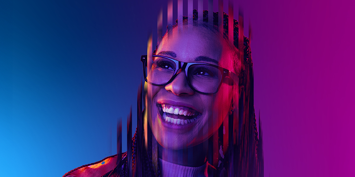 Woman with glasses smiling